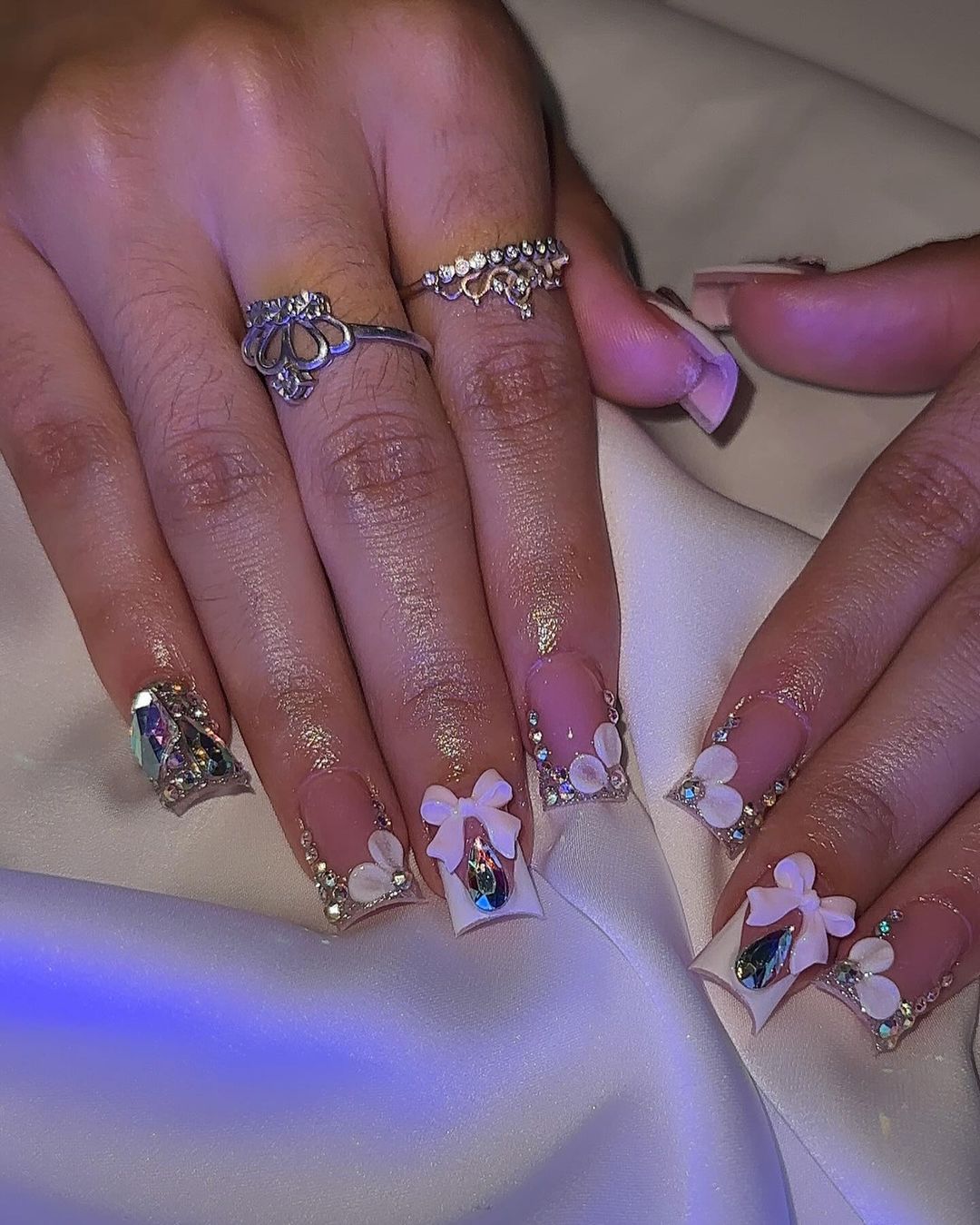 Square V-tip Clear And White Nails With Rhinestones and Bows