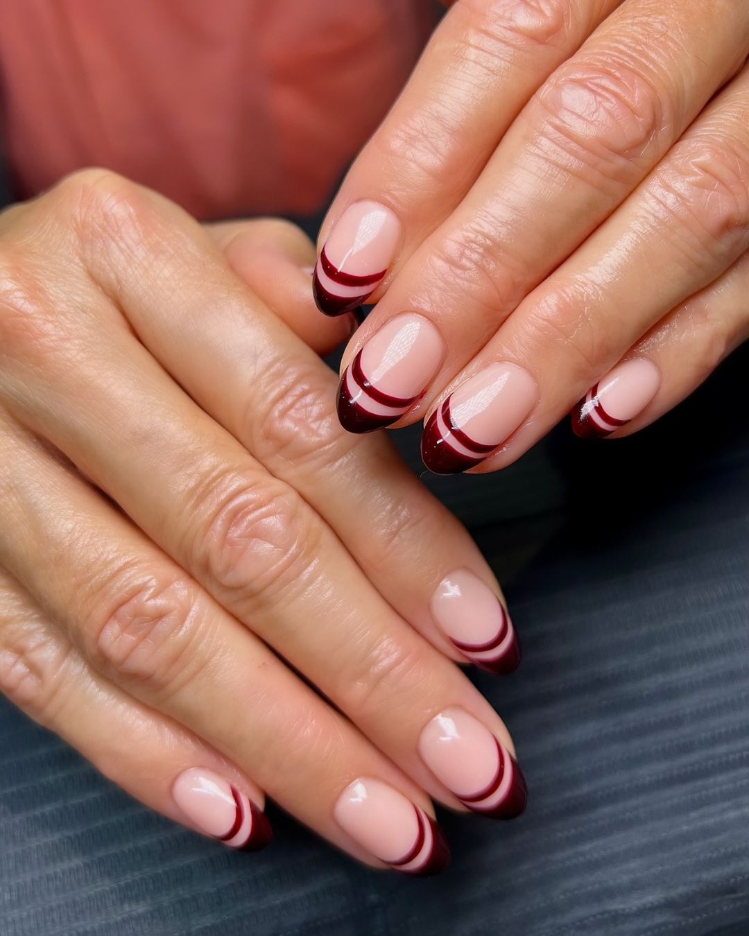 Nude Almond Nails With Burgundy Tips