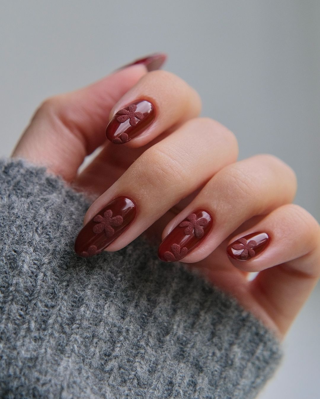 Oval Burgundy Nails With FMatte Floral Design