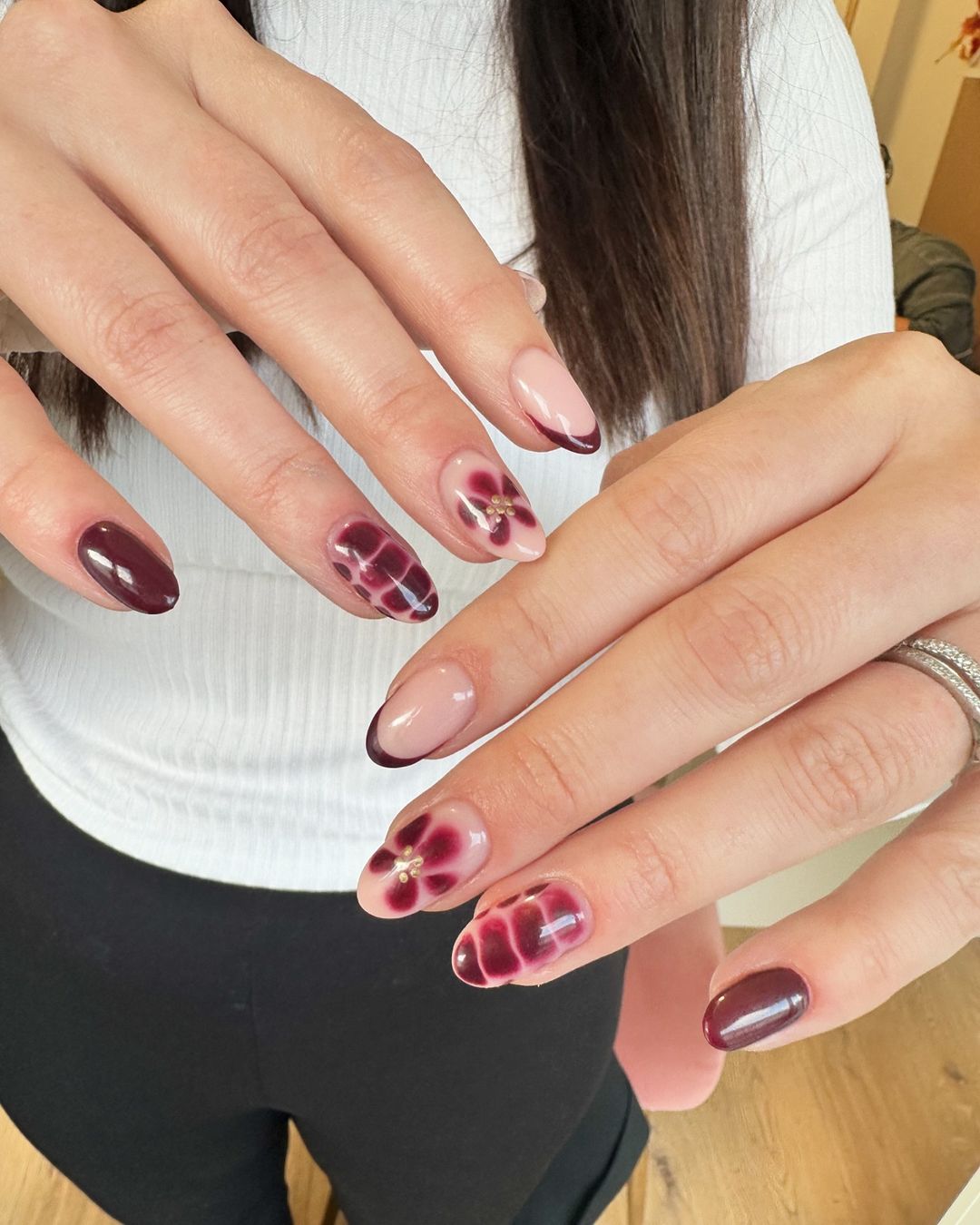 Short Oval Nude With Burgundy Aura Floral Nails