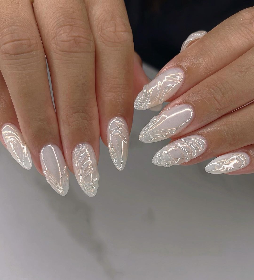 White Chrome Almond Nails With Acrylic Swirsl