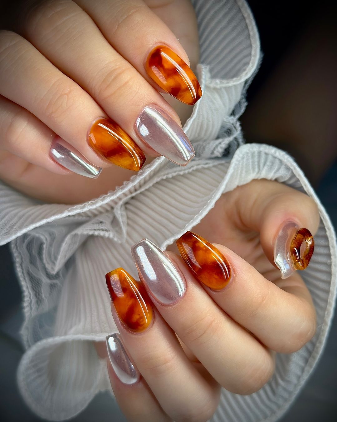 White Chrome And Amber Nails